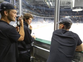 Cole Tymkin, Antonio Stranges and Nathan Dunkley of the Knights watch an intrasquad game on the first day of the Knights training camp in London, Ont.  Photograph taken on Monday August 26, 2019.  Mike Hensen/The London Free Press/Postmedia Network