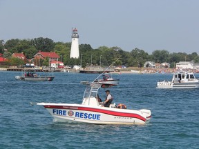 Police, fire and coast guard vessels from both sides of the St. Clair River are shown in this file photo ready for the start of the 2017 float down. Coast guards in Canada and the U.S. are recommending against taking part in the event set this year for Sunday afternoon.