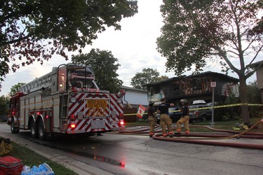 London firefighters responded to a reports of house fire on Millbank Drive early Tuesday. One man was taken to hospital with minor injuries following the blaze, which caused extensive damage to the home. JONATHAN JUHA/THE LONDON FREE PRESS