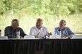 Ontario Premier Doug Ford is flanked on the right by Ernie Hardeman, Minister of Agriculture, Food and Rural Affairs (OMAFRA) and Toby Barrett, parliamentary assistant to OMAFRA, at a meeting with producers at Canada's Outdoor Farm Show on Sept. 10, 2019. (Kathleen Saylors/Postmedia Network)