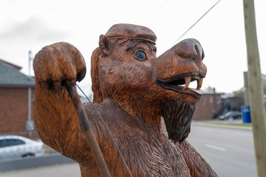 One of the newest sculptures on the Hamilton Road tree trunk tour was created for the Juno Awards and features an animal rock band. Dave Broostad, project coordinator, always wanted a music-themed sculpture with a wolf "howling at the moon." (MAX MARTIN, The London Free Press)