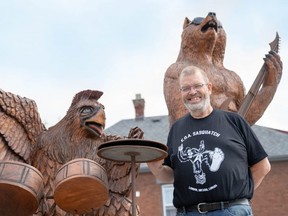 Dave Broostad, project coordinator for the Hamilton Road BIA, is sharing the stories behind the Hamilton Road tree trunk tour sculptures this weekend as part of Doors Open London. One of the newest sculptures was created for the Juno Awards and features an animal rock band. (MAX MARTIN, The London Free Press)