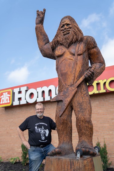 Dave Broostad, project coordinator for the Hamilton Road BIA, is sharing the stories behind the Hamilton Road tree trunk tour sculptures this weekend as part of Doors Open London. The Sasquatch sculpture was inspired by the Bobnoxious song EOA, which references the tree carvings. (MAX MARTIN, The London Free Press)