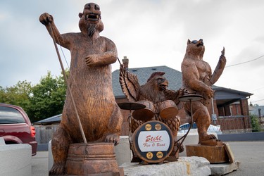 One of the newest sculptures on the Hamilton Road tree trunk tour was created for the Juno Awards and features an animal rock band. Dave Broostad, project coordinator, always wanted a music-themed sculpture with a wolf "howling at the moon." (MAX MARTIN, The London Free Press)