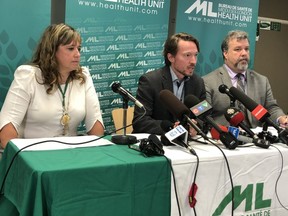 Middlesex London Health Unit chronic disease and tobacco control manager Linda Stobo, left, chief medical officer of health Dr. Chris Mackie and communications manager Dan Flaherty, give details about an unidentified London-area teen hospitalized with a vaping-related lung illness. The teen is believed to be the first reported case of e-ciagrette-related respiratory illness in Canada after more than 380 cases and six deaths linked to vaping in the United States. (Jennifer Bieman/The London Free Press)