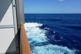 Monster waves began to calm after the Carnival Sunrise turned back toward New York in this balcony photo. (Jim Fox)