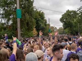 Students and young people take over Broughdale Avenue during the annual Fake Homecoming (FoCo) celebrations on Saturday, Sept. 28, 2019. (MAX MARTIN, The London Free Press)