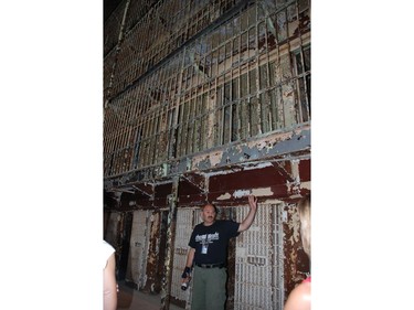 Leading a tour of the Ohio State Reformatory, Ron Puff notes the six tiers of cells. The giant jail contains the world's largest free-standing steel cell block. (BARBARA TAYLOR, The London Free Press)