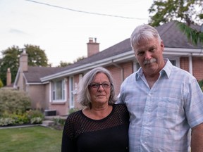 Old South residents Pam Kenward and Alan Luke say they've dealt with a host of disruptions and concerns since the house beside them started being offered through an online short-term rental service two years ago. (Max Martin, The London Free Press)
