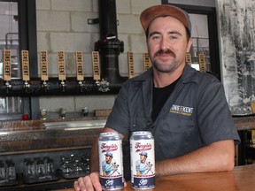 Colin Chrysler, a founding partner of Sons on Kent Brewing Company, displays cans of Fergie's Classic Pilsner, a special edition beer being released on Friday that will see part of the proceeds go to the Children's Treatment Centre Foundation of Chatham-Kent for the benefit of the campaign to build a new centre in Chatham. (Ellwood Shreve/Chatham Daily News)