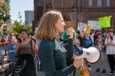 Student organizer Genevieve Langille, 16, helped plan London's Global Climate Strike. She led hundreds of students through chants, echoing "system change, not climate change" through the streets of downtown. (Max Martin, The London Free Press)