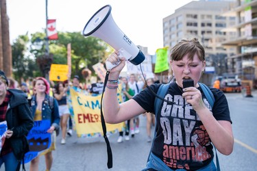 Audrey Rollo, 13, leads chants to a group of students fighting climate change as part of the Global Climate Strike. "What do we want? Climate action! When do we want it? Now!" was one of the strikers' main chants. (Max Martin, The London Free Press)