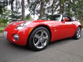 London police are looking for a man who stole a red 2007 Pontiac Solstice convertible, similar to the one pictured here, after assaulting the driver Monday at a downtown London intersection. (London police)