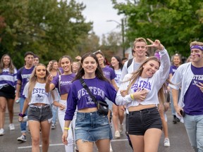 Students and young people crowd onto Broughdale Avenue during the annual Fake Homecoming (FoCo) celebrations on Saturday, Sept. 28, 2019. (MAX MARTIN, The London Free Press)