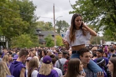 Students and young people take to Broughdale Avenue as part of the annual FOCO, or Fake Homecoming, celebrations on Saturday, Sept. 28, 2019. (MAX MARTIN, The London Free Press)