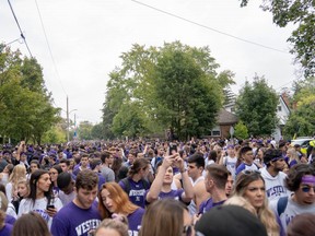 London police estimate 25,000 students and young people attended the FoCo (Fake Homecoming) party Saturday on Broughdale Avenue near Western University. The crowd was better behaved than in past years, police said, but the cost of bringing in outside officers was an estimated $300,000. (MAX MARTIN, The London Free Press)