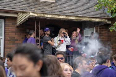 Students and young people take to Broughdale Avenue as part of the annual FOCO, or Fake Homecoming, celebrations on Saturday, Sept. 28, 2019. (MAX MARTIN, The London Free Press)