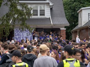 Students and young people crowd onto Broughdale Avenue during the annual Fake Homecoming (FoCo) celebrations on Saturday. (Max Martin, The London Free Press)