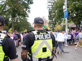 London police keep watch over Fake Homecoming, or FoCo, bashes on Broughdale Avenue near Western University. Photo taken Saturday Sept. 28, 2019 (Max Martin/The London Free Press)