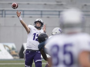 Western's Chris Merchant airs it out during the third quarter of Ontario University Athletics football action between the Western Mustangs and the Windsor Lancers at Alumni Field, Saturday, Sept. 28, 2019.   (DAX MELMER/Windsor Star)