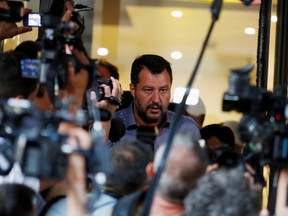 Italian Interior Minister and leader of the League party Matteo Salvini speaks to the media at the end of a meeting with Lega Nord's deputies, as Italian Senate is due to set a date to hold a no-confidence vote in the government in Rome, Italy, August 12, 2019. (REUTERS/Remo Casilli)