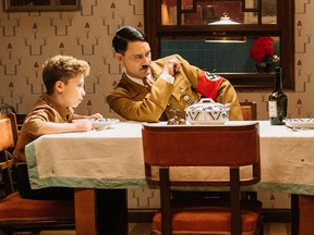 Jojo (Roman Griffin Davis) with his imaginary friend Adolf (Taika Waititi).