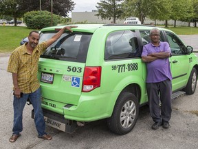 Adil Mohamed (left) and Jafer Elhilo drive accessible cabs fro Green Taxi in London, Ont. on Wednesday September 4, 2019. Derek Ruttan/The London Free Press/Postmedia Network
