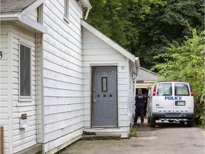 Police on scene at 113 Elm Street, in London, where gun shot emanated from in the morning of Friday September 6, 2019. A neighbour described the dwelling as a "crack house." (Derek Ruttan/The London Free Press)