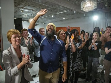 NDP leader Jagmeet Singh waves to supporters after entering a room full of party faithful during a rally at Goodwill Industries in London, Ont. on Tuesday September 10, 2019. (Derek Ruttan/The London Free Press)