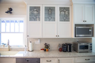 Leaded glass panels were added to the kitchen cabinets at 398 Regent St. Derek Ruttan/The London Free Press