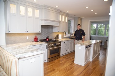 270 Huron Street was renovated by Arne Madsen of CCR Building and Remodeling stands next to a large island with wine storage which adds work space to the kitchen at 270 Huron St. Derek Ruttan/The London Free Press