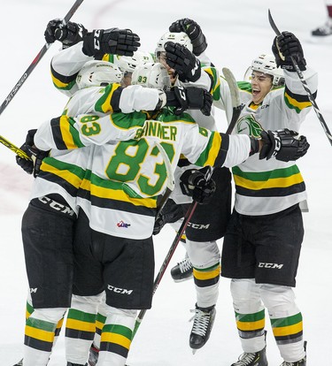 London Knights celebrate their first goal of the season by Hunter Skinner during the first period of their game at Bud Gardens in London, Ont. on Saturday September 21, 2019.  L To R Kirill Steklov, Matvey Gustov, Hunter Skinner, Antonio Stranges and Luke Evangelista.   Derek Ruttan/The London Free Press/Postmedia Network