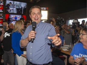 Conservative Party Leader Andrew Scheer addresses faithful at a rally at the Crabby Joe's restaurant on Oxford Road at Capulet Lane in London on Tuesday. (Derek Ruttan/The London Free Press)