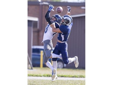 Parkside's Ethan Georgijev can't make the catch in the end zone while covered by Laurier's Alex Andrews in TVRA action in London on Thursday. (Derek Ruttan, The London Free Press)