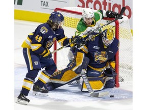 London Knight Nathan Dunkley finds himself on the wrong side of  Erie Otters goaltender Daniel Murphy  and Luke Beamish during the first period of their OHL game at Budweiser Gardens in London, Ont. on Friday Sept. 27, 2019. Derek Ruttan/The London Free Press