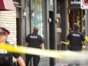 Londoners continue to react to a Tuesday morning confrontation on King Street during which a London police officer drew his gun and fired twice as a man with an “edged weapon” charged at him. Both shots missed and no one was hurt, police said. (Mike Hensen, The London Free Press)