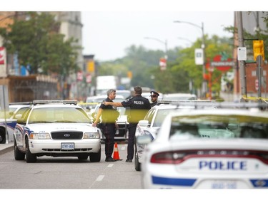 A man with a knife was apprehended on King Street just east of Richmond on Tuesday September 3, 2019.  There are reports shots were fired during the event. (Mike Hensen/The London Free Press)