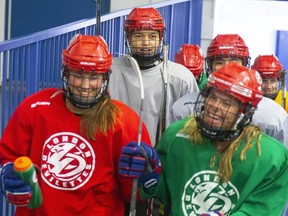 Nicole Gosling, centre rear in grey, was captain of the Jr. Devilettes in 2019.  (Mike Hensen/The London Free Press)