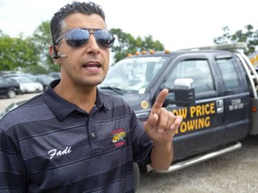 Fadi Ibrahim, owner of Low Price Towing, is angry about the prospect of a new bylaw that would require tow trucks to stay away from crash scenes, unless called by a motorist. Ibrahim says this will increase drastically the time it takes to clear cars from an accident scene, causing more danger to motorists and emergency workers. Ibrahim feels the city is killing his business in favour of Ross Towing which has a city contract. (Mike Hensen/The London Free Press)