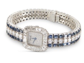 This Piaget 18K white gold, diamond and sapphire watch sold for $25,875 at a Miller & Miller auction.