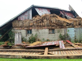 A Rokeby Line barn suffered extensive damage following Wednesday evening's storm. Environment Canada is now investigating whether a tornado touched down in the Petrolia area. (Carl Hnatyshyn/Sarnia This Week)