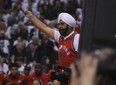Toronto Raptors "superfan" Nav Bhatia leads the charge during the first quarter in Toronto, Ont. on Wednesday April 25, 2018. (Jack Boland/Postmedia Network)