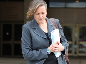 OPP Const. Ashleigh Billing leaves the London courthouse on Tuesday after testifying at the trial of London police Const. Nicholas Doering, who is charged with criminal negligence causing death and failing to provide the necessaries of life in the Sept. 7, 2016, custody death of Debra Chrisjohn. (DALE CARRUTHERS, The London Free Press)