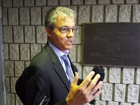 Brian Wilkie, a lawyer representing the Ministry of the Attorney General, speaks outside Provincial Offences Court in Blenheim on Wednesday. (Trevor Terfloth/The Daily News)