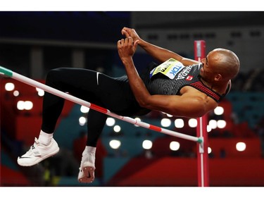 Damian Warner of London had a season's best jump of 2.02 metres in the high jump, finishing eighth in the field, during the men's decathlon at the IAAF World Athletics Championships in Doha, Qatar, Tuesday.