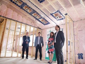 Joe Voccaro CEO of the Ontario Home Builders Association addresses a press conference as Louie Zagordo president of the Sudbury & District Home Builders Association, Guido Mazza Greater Sudbury's Chief Building Official, Siloni Waraich vice president of Tarion look on as they discuss illegal building in Sudbury, Ont. on Tuesday May 16, 2017.