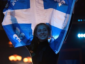 Fan reacts to the results at the election party of Bloc Quebecois.  REUTERS/Andrej Ivanov