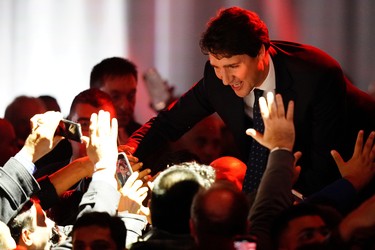 Liberal leader and Canadian Prime Minister Justin Trudeau greets people after the federal election at the Palais des Congres in Montreal, Quebec, Canada October 22, 2019. REUTERS/Carlo Allegri ORG XMIT: CRA311