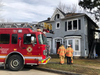 Firefighters respond to a house fire in a boarding house on St. Andrews Street between Oxford Street and Empress Avenue, close to Wharncliffe Road on Dec. 19, 2018. (JONATHAN JUHA, The London Free Press)