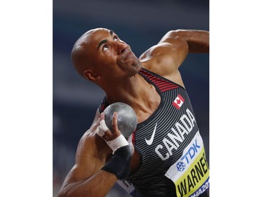 London's Damian Warner competes in the shot put of the men's decathlon at the World Athletics Championships in Doha, Qatar, Tuesday. His throw of 15.17 metres placed him eighth.